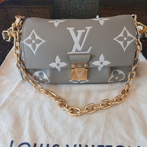 Louis Vuitton Favorite M45836, 9.4x5.5x3.5 inches. Color: Tourterelle Gray/Cream